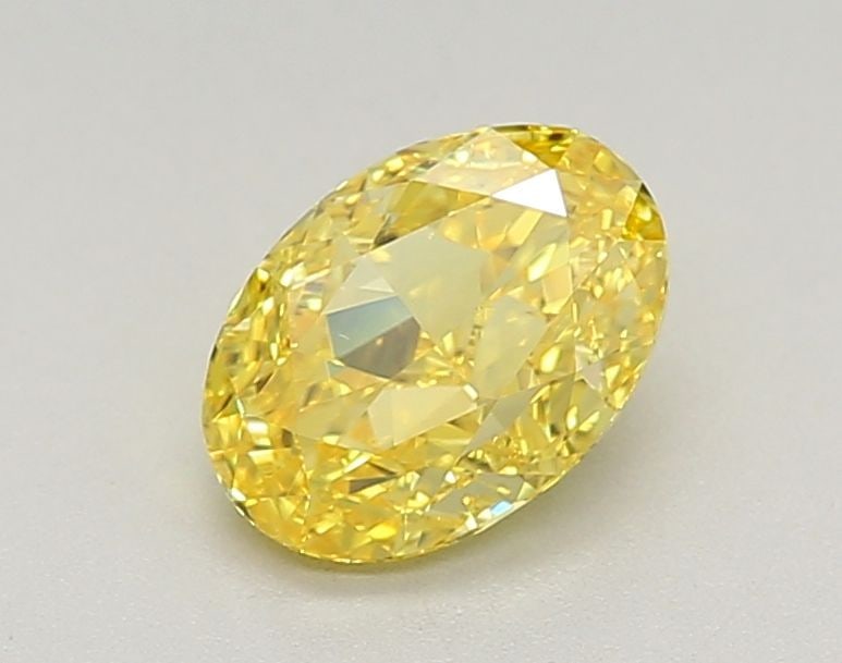 Loose Diamond - OVAL 1.02ct Fancy Vivid Yellow VS1: Loose Diamond - OVAL 1.02ct Fancy Vivid Yellow VS1 Source: This is a real non-mined Diamond that has been grown in a lab Shape: OVAL Carats: 1.02 Color: Fancy Vivid Yellow Certification: IGI Video: