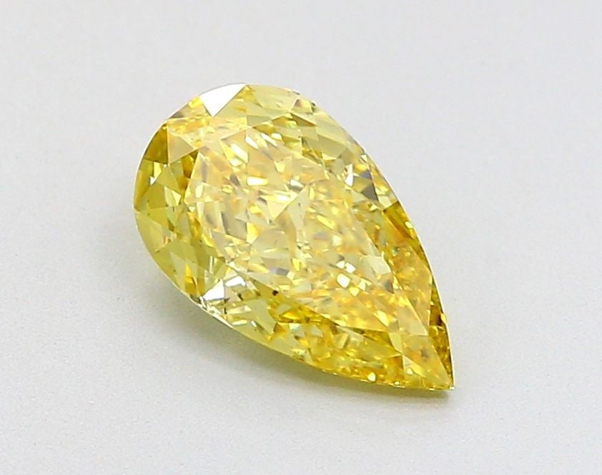 Loose Diamond - PEAR 1.37ct Fancy Vivid Yellow VS2: Loose Diamond - PEAR 1.37ct Fancy Vivid Yellow VS2 Source: This is a real non-mined Diamond that has been grown in a lab Shape: PEAR Carats: 1.37 Color: Fancy Vivid Yellow Certification: IGI Video: