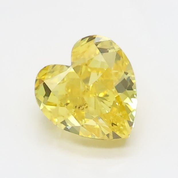 Loose Diamond - HEART 0.71ct Fancy Vivid Yellow VVS2: Loose Diamond - HEART 0.71ct Fancy Vivid Yellow VVS2 Source: This is a real non-mined Diamond that has been grown in a lab Shape: HEART Carats: 0.71 Color: Fancy Vivid Yellow Certification: IGI Video: