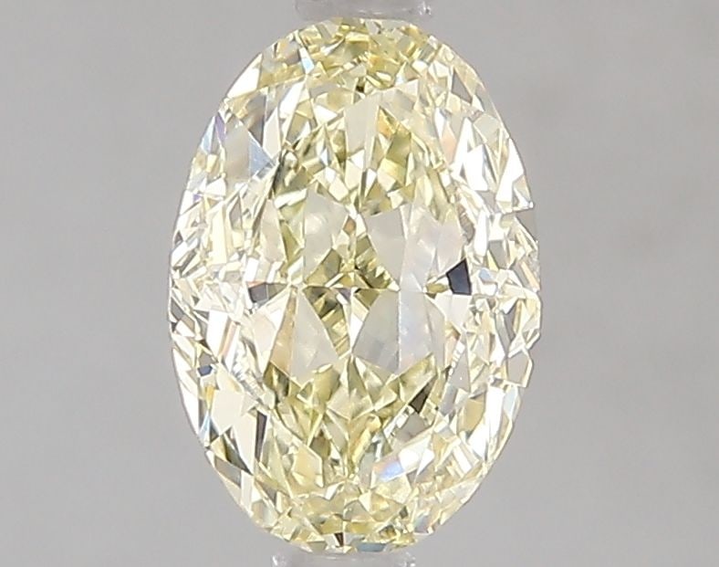 Loose Diamond - OVAL 1.55ct Fancy Light Yellow VVS2: Loose Diamond - OVAL 1.55ct Fancy Light Yellow VVS2 Source: This is a real non-mined Diamond that has been grown in a lab Shape: OVAL Carats: 1.55 Color: Fancy Light Yellow Certification: IGI Video: