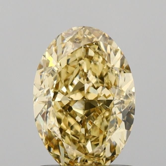 Loose Diamond - OVAL 1.07ct Fancy Light Yellow VS1: Loose Diamond - OVAL 1.07ct Fancy Light Yellow VS1 Source: This is a real non-mined Diamond that has been grown in a lab Shape: OVAL Carats: 1.07 Color: Fancy Light Yellow Certification: IGI Video: