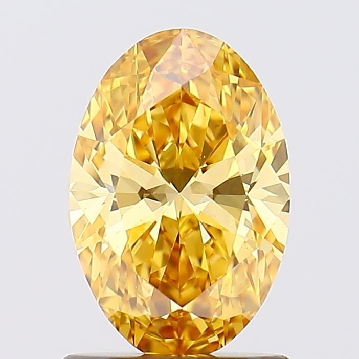 Loose Diamond - OVAL 1.04ct Fancy Vivid Yellow VS1: Loose Diamond - OVAL 1.04ct Fancy Vivid Yellow VS1 Source: This is a real non-mined Diamond that has been grown in a lab Shape: OVAL Carats: 1.04 Color: Fancy Vivid Yellow Certification: IGI Video: