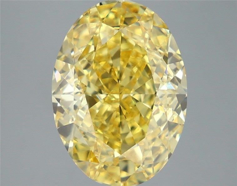 Loose Diamond - OVAL 6.09ct Fancy Vivid Yellow VS1: Loose Diamond - OVAL 6.09ct Fancy Vivid Yellow VS1 Source: This is a real non-mined Diamond that has been grown in a lab Shape: OVAL Carats: 6.09 Color: Fancy Vivid Yellow Certification: IGI Video: