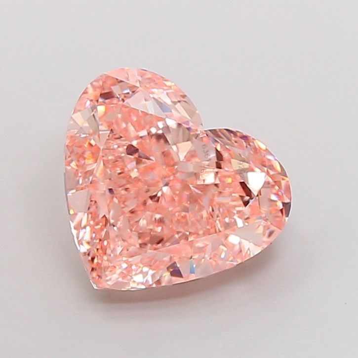 Loose Diamond - HEART 7.09ct Fancy Vivid Pink VVS2: Loose Diamond - HEART 7.09ct Fancy Vivid Pink VVS2 Source: This is a real non-mined Diamond that has been grown in a lab Shape: HEART Carats: 7.09 Color: Fancy Vivid Pink Certification: IGI Video: