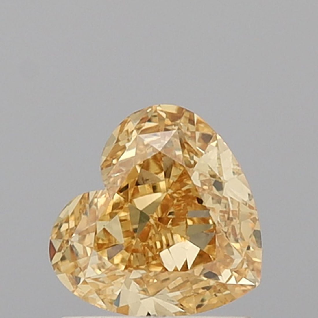 Loose Diamond - HEART 1.02ct Fancy Intense Yellow VS1: Loose Diamond - HEART 1.02ct Fancy Intense Yellow VS1 Source: This is a real non-mined Diamond that has been grown in a lab Shape: HEART Carats: 1.02 Color: Fancy Intense Yellow Certification: NONE Vi