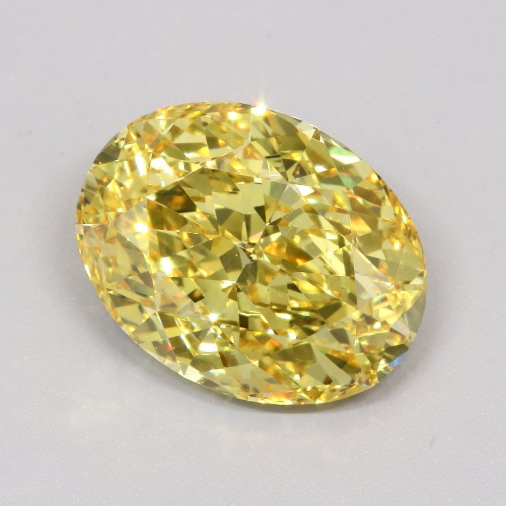Loose Diamond - OVAL 7.03ct Fancy Vivid Yellow VS1: Loose Diamond - OVAL 7.03ct Fancy Vivid Yellow VS1 Source: This is a real non-mined Diamond that has been grown in a lab Shape: OVAL Carats: 7.03 Color: Fancy Vivid Yellow Certification: IGI Video: