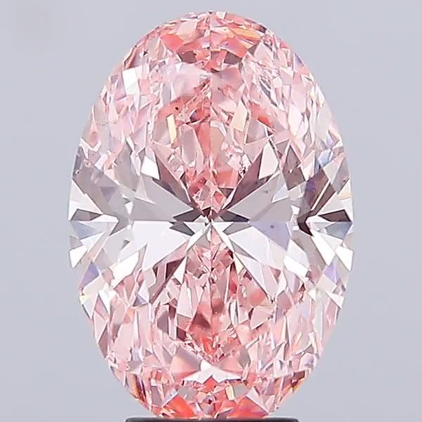 Loose Diamond - OVAL 5.49ct Fancy Vivid Pink VS2: Loose Diamond - OVAL 5.49ct Fancy Vivid Pink VS2 Source: This is a real non-mined Diamond that has been grown in a lab Shape: OVAL Carats: 5.49 Color: Fancy Vivid Pink Certification: IGI Video: