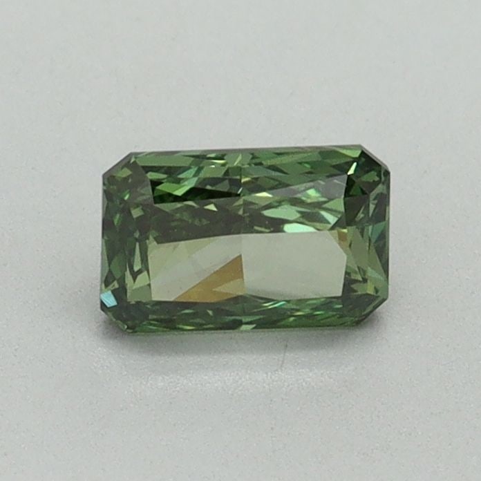 Loose Diamond - RADIANT 0.53ct Fancy Vivid Green VS2: Loose Diamond - RADIANT 0.53ct Fancy Vivid Green VS2 Source: This is a real non-mined Diamond that has been grown in a lab Shape: RADIANT Carats: 0.53 Color: Fancy Vivid Green Certification: IGI Video