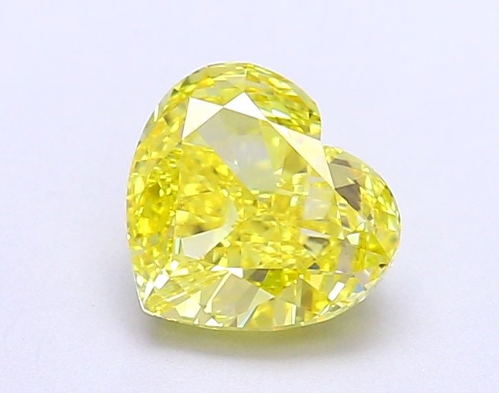 Loose Diamond - HEART 1.4ct Fancy Vivid Yellow VVS2: Loose Diamond - HEART 1.4ct Fancy Vivid Yellow VVS2 Source: This is a real non-mined Diamond that has been grown in a lab Shape: HEART Carats: 1.4 Color: Fancy Vivid Yellow Certification: IGI Video: