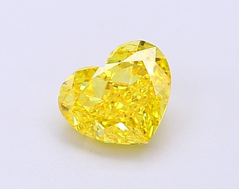 Loose Diamond - HEART 1.06ct Fancy Vivid Yellow VS1: Loose Diamond - HEART 1.06ct Fancy Vivid Yellow VS1 Source: This is a real non-mined Diamond that has been grown in a lab Shape: HEART Carats: 1.06 Color: Fancy Vivid Yellow Certification: IGI Video: