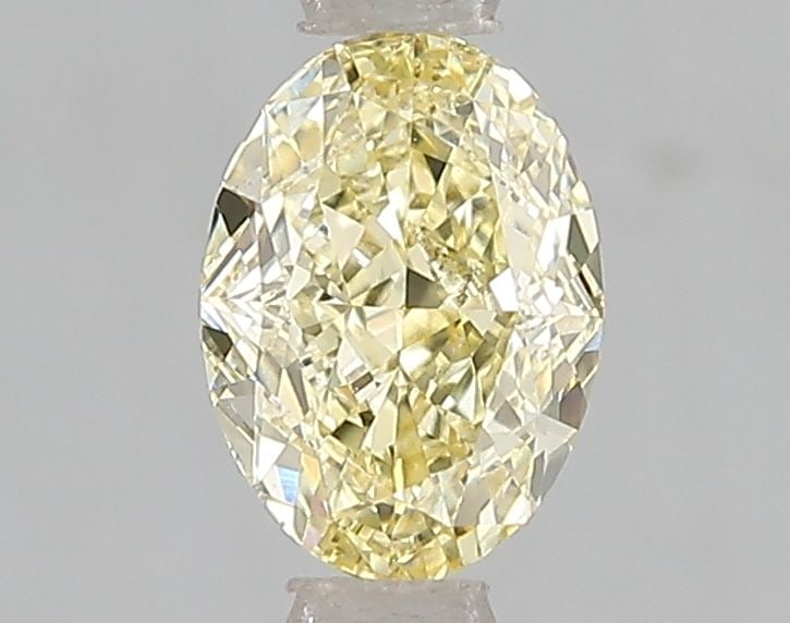 Loose Diamond - OVAL 1.01ct Fancy Intense Yellow VS2: Loose Diamond - OVAL 1.01ct Fancy Intense Yellow VS2 Source: This is a real non-mined Diamond that has been grown in a lab Shape: OVAL Carats: 1.01 Color: Fancy Intense Yellow Certification: IGI Video