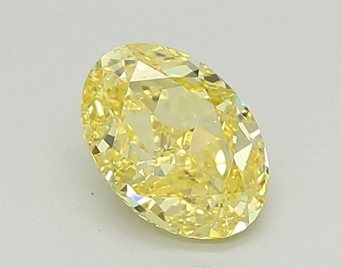 Loose Diamond - OVAL 1.01ct Fancy Vivid Yellow VS2: Loose Diamond - OVAL 1.01ct Fancy Vivid Yellow VS2 Source: This is a real non-mined Diamond that has been grown in a lab Shape: OVAL Carats: 1.01 Color: Fancy Vivid Yellow Certification: IGI Video: