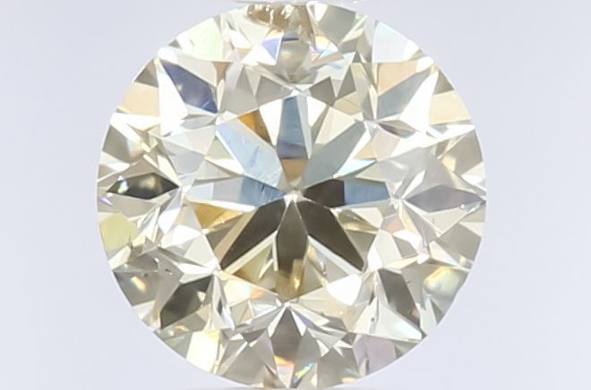 Loose Diamond - ROUND 0.61ct Fancy Light Yellow Brown: Loose Diamond - ROUND 0.61ct Fancy Light Yellow Brown Source: Natural Shape: ROUND Carats: 0.61 Color: Fancy Light Yellow Brown Certification: GIA Video: