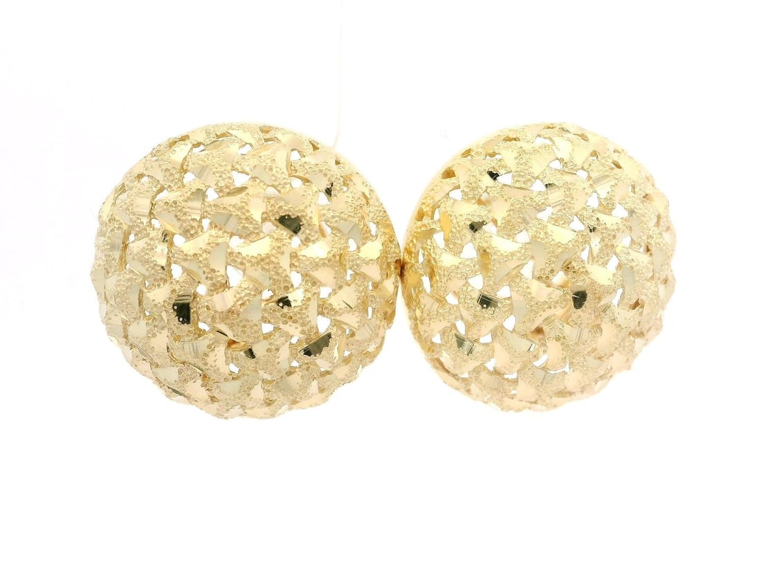 Omega 14k Yellow Gold Textured Diamond Cut Button Earrings: Omega 14k Yellow Gold Textured Diamond Cut Button Earrings Elevate your accessory game with these exquisite Omega earrings, crafted from solid 14K yellow gold. These textured, diamond-cut earrings fea