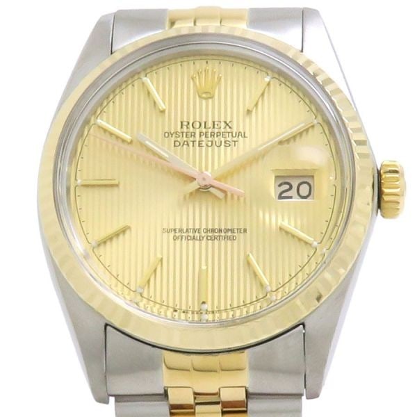 Rolex 16013 Datejust 36mm Men's Automatic Watch: Rolex 16013 Datejust 36mm Men's Automatic Watch This Rolex Datejust 36mm men's wristwatch, model 16013, features a stainless steel and yellow gold construction. The dial is adorned with a champagne go