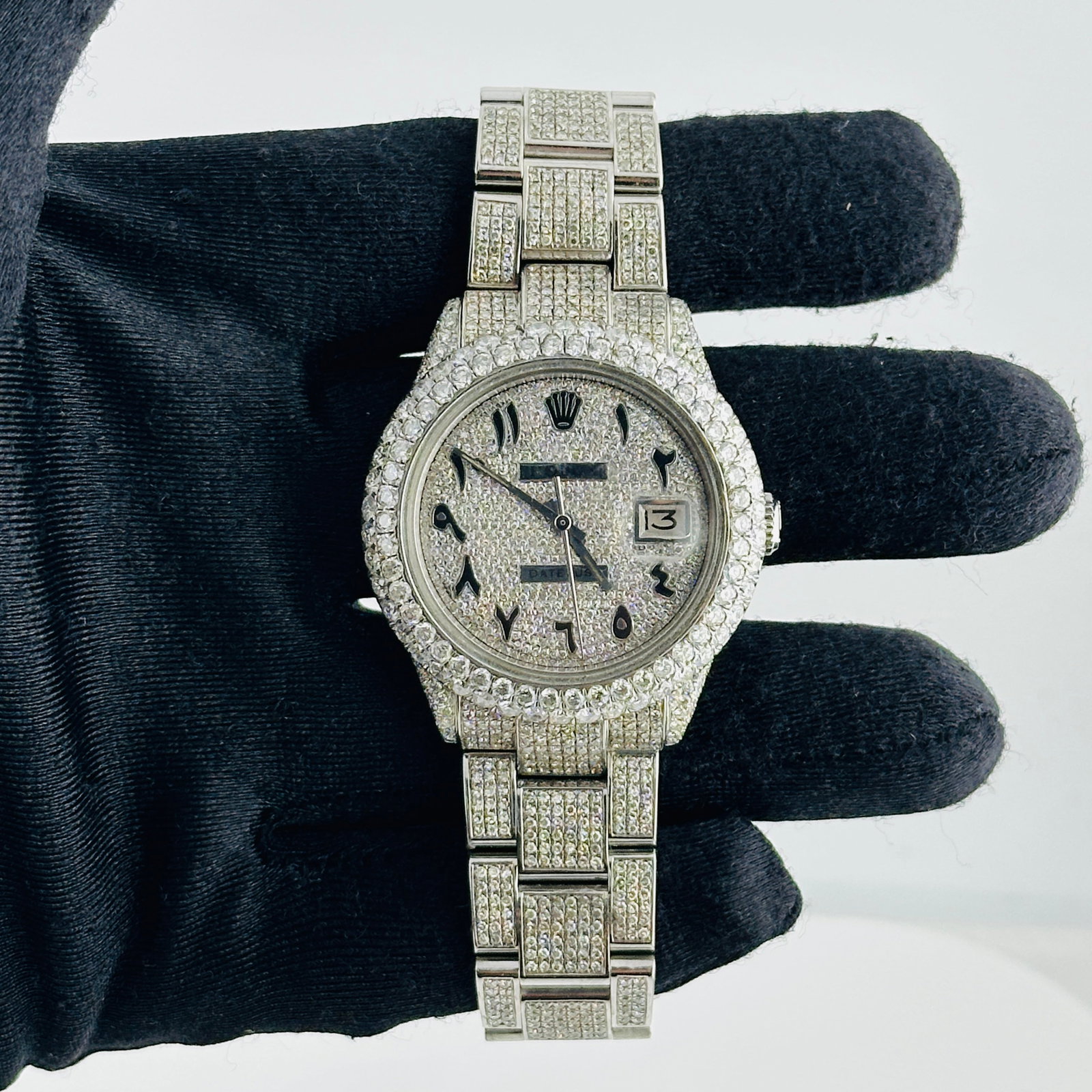 Rolex Datejust 1601 Diamond Arabic Dial Jubilee Bracelet: Rolex Datejust 1601 Diamond Arabic Dial Jubilee Bracelet This Rolex Datejust features a diamond Arabic dial and a two-row bubble diamond bezel, offering a luxurious and eye-catching aesthetic. The wat