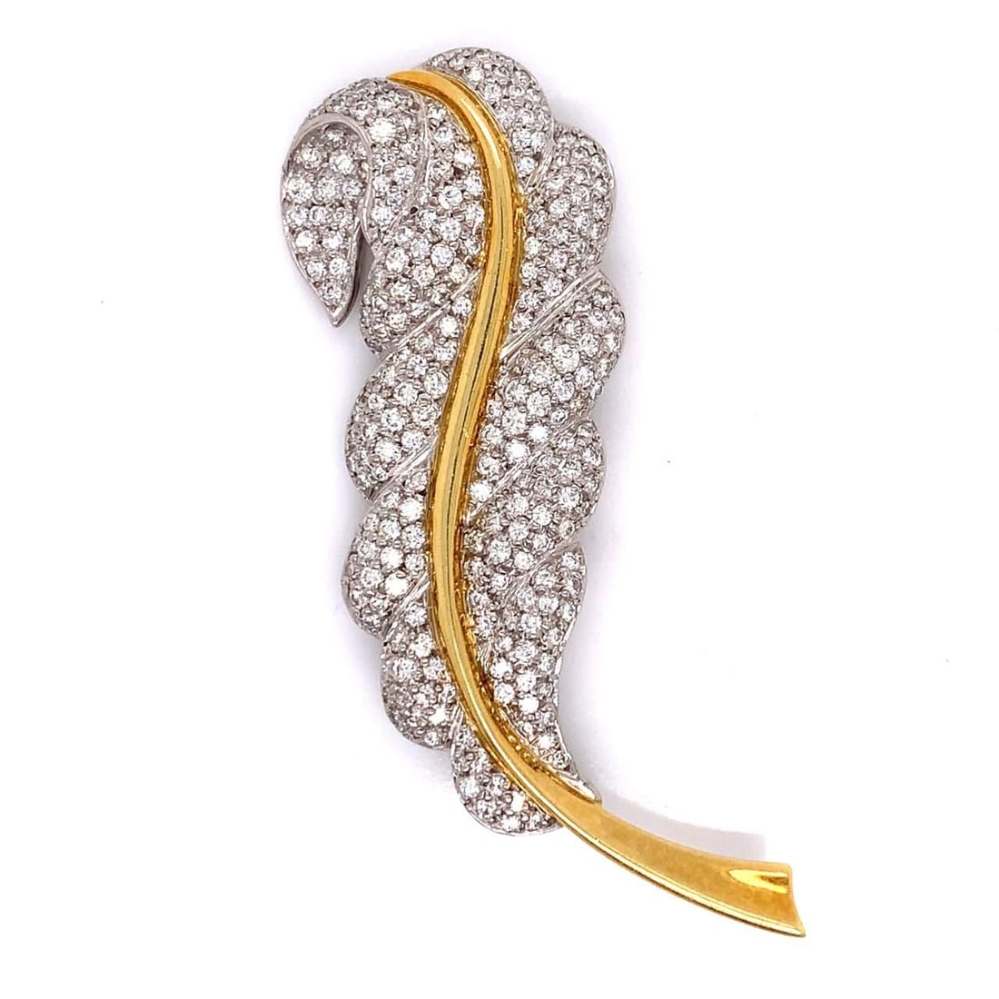 Elan 6.75 Ct Diamond Feather Brooch in 18K Gold & Platinum: Elan 6.75 Ct Diamond Feather Brooch in 18K Gold & Platinum This exquisite feather brooch showcases a stunning arrangement of 239 round diamonds, totaling approximately 6.75 carats. The diamonds exhibi