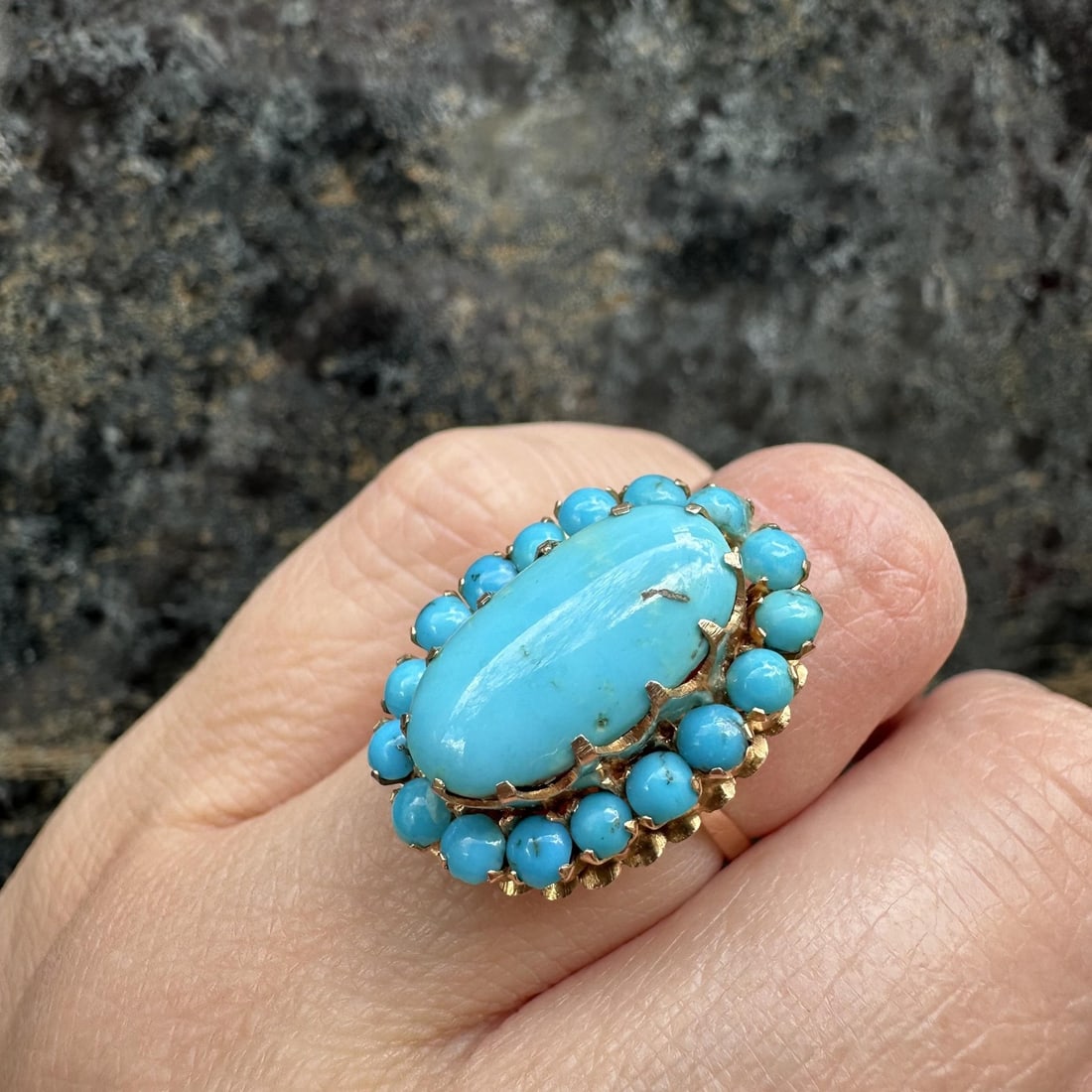14k Yellow Gold Turquoise Halo Cocktail Ring Size 5 Vintage Handmade: 14k Yellow Gold Turquoise Halo Cocktail Ring Size 5 Vintage Handmade This vintage handmade cocktail ring features a striking oval cabochon-cut natural turquoise at the center, surrounded by a halo of 