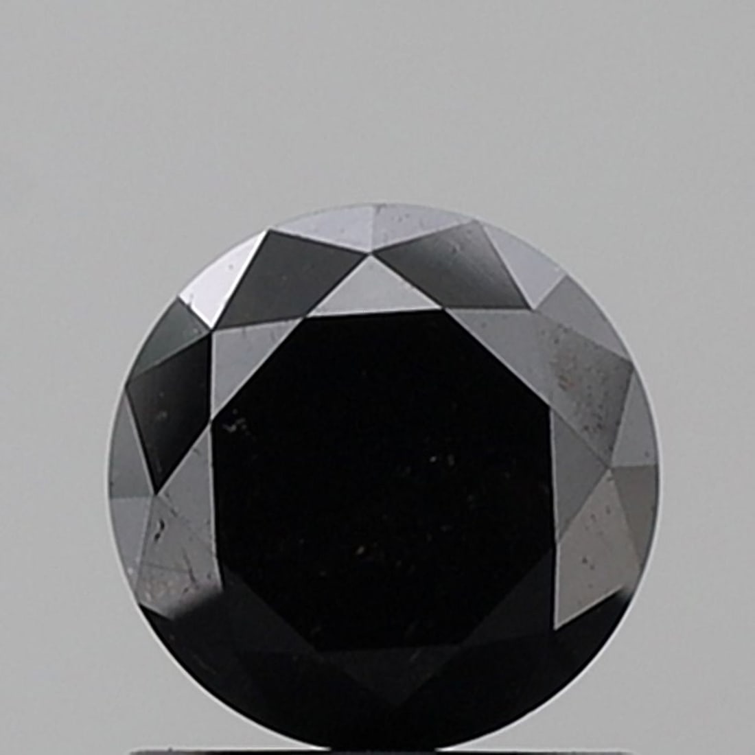 Loose Diamond - ROUND 1.25ct Fancy Black VVS2: Loose Diamond - ROUND 1.25ct Fancy Black VVS2 Source: Natural Shape: ROUND Carats: 1.25 Color: Fancy Black Certification: NONE Video:
