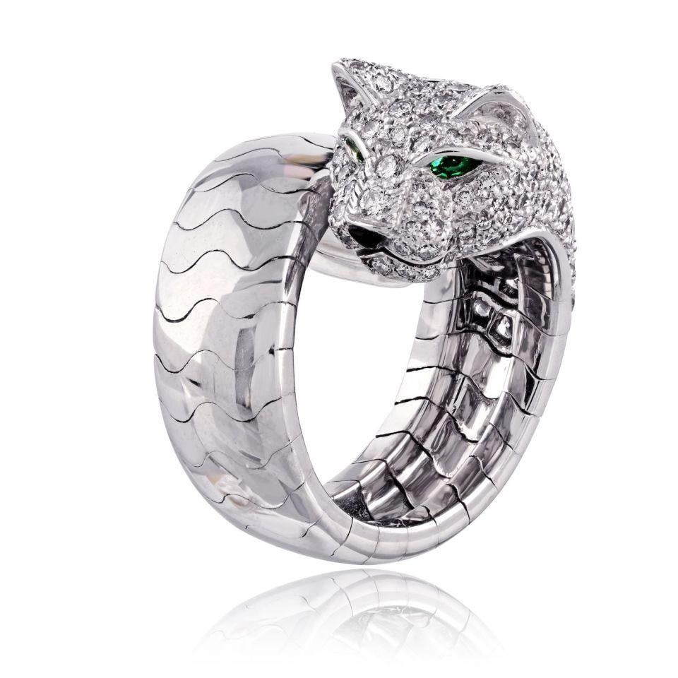 Cartier Panthere ring in 18K white gold size 6: Cartier Panthere ring in 18K white gold size 6 This pre-owned Cartier Panthere ring is crafted in 18K white gold and presented in estate condition. It is a ring size 6 and has a stated weight of 20.9 