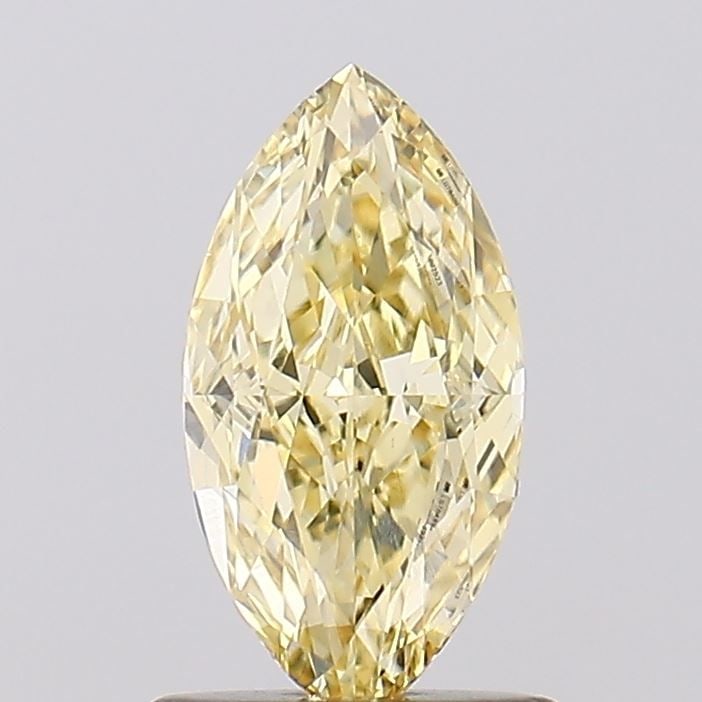 Loose Diamond - MARQUISE 1.08ct Fancy Light Yellow VVS2: Loose Diamond - MARQUISE 1.08ct Fancy Light Yellow VVS2 Source: This is a real non-mined Diamond that has been grown in a lab Shape: MARQUISE Carats: 1.08 Color: Fancy Light Yellow Certification: IGI 
