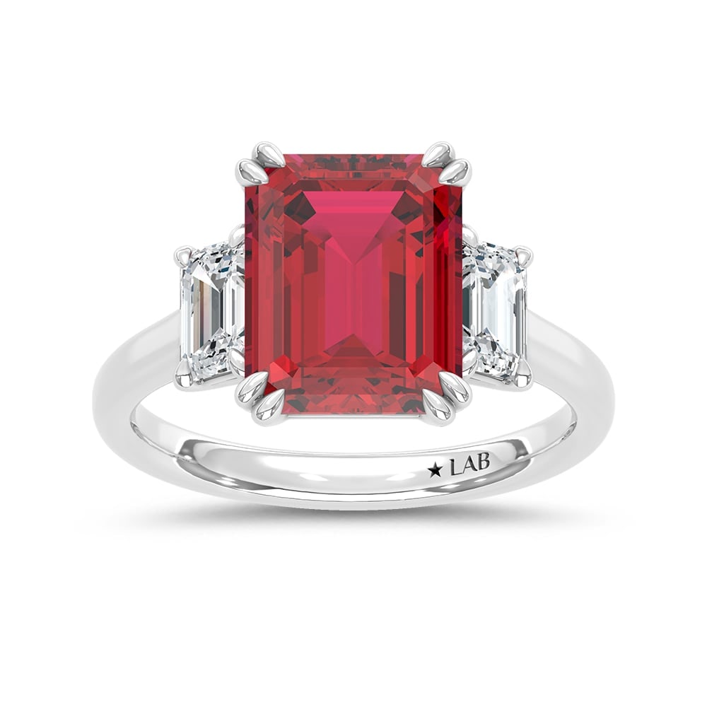 14K White Gold Lab Grown Diamond 5 1/2 Ct.Tw. Emerald Shape Recrystalized Ruby Engagement Ring: 14K White Gold Lab Grown Diamond 5 1/2 Ct.Tw. Emerald Shape Recrystalized Ruby Engagement Ring (Center 4 1/2 ct) Elevate your elegance with this 14K white gold engagement ring. Its centerpiece is a da