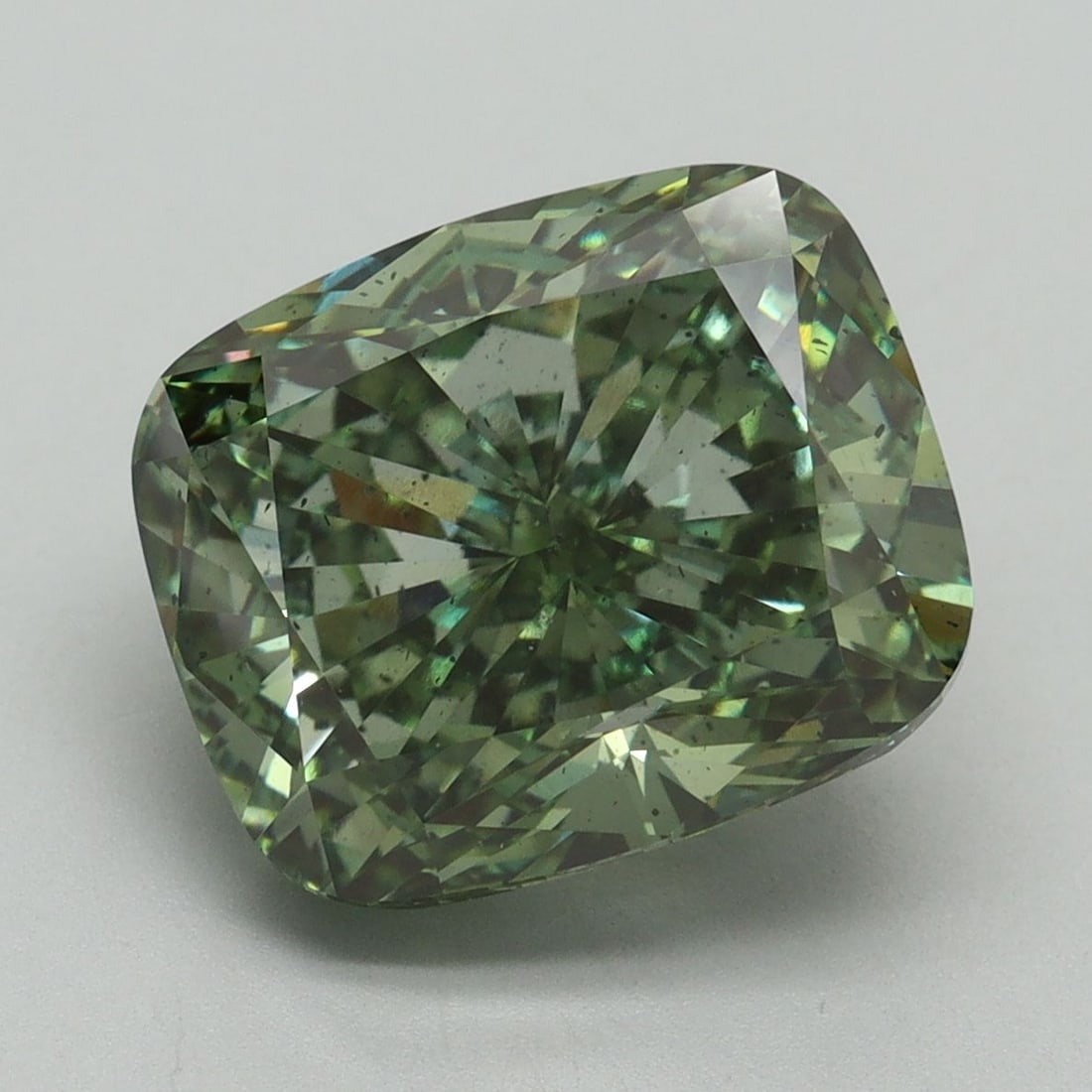 Loose Diamond - CUSHION BRILLIANT 6.57ct Fancy Vivid Green SI2: Loose Diamond - CUSHION BRILLIANT 6.57ct Fancy Vivid Green SI2 Source: This is a real non-mined Diamond that has been grown in a lab Shape: CUSHION BRILLIANT Carats: 6.57 Color: Fancy Vivid Green Cert