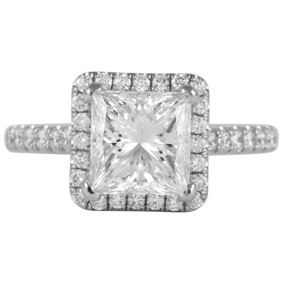 2.05ct GIA H VS1 Princess Cut Diamond Ring 18k White Gold: 2.05ct GIA H VS1 Princess Cut Diamond Ring 18k White Gold This exquisite princess cut diamond ring features a stunning 2.05 carat center stone, graded H for color and VS1 for clarity by GIA. The ring 