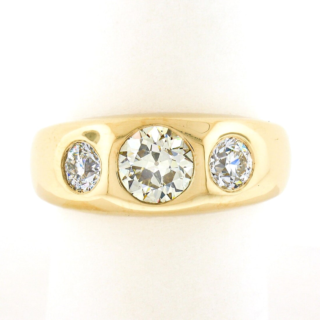 18K Yellow Gold 1.96ct GIA Certified 3 Stone Diamond Gypsy Band Ring: 18K Yellow Gold 1.96ct GIA Certified 3 Stone Diamond Gypsy Band Ring This stunning men's band ring is crafted in solid 18K yellow gold and features three exquisite old European cut diamonds, totaling 