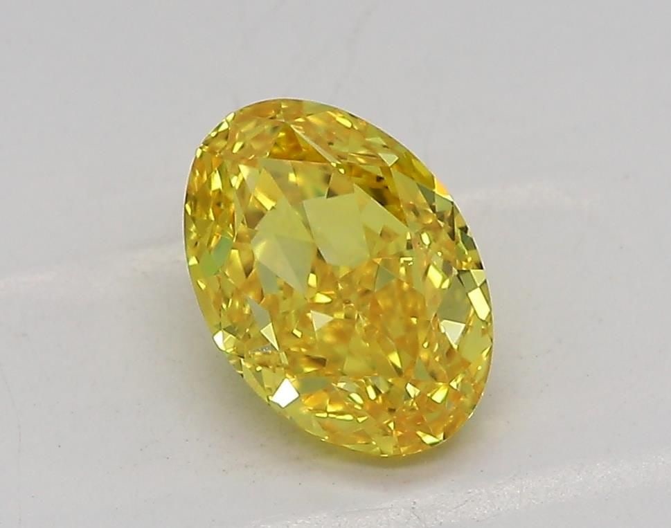Loose Diamond - OVAL 1.1ct Fancy Vivid Yellow VVS2: Loose Diamond - OVAL 1.1ct Fancy Vivid Yellow VVS2 Source: This is a real non-mined Diamond that has been grown in a lab Shape: OVAL Carats: 1.1 Color: Fancy Vivid Yellow Certification: IGI Video: