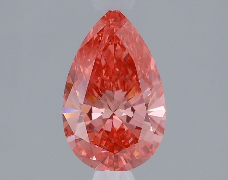 Loose Diamond - PEAR 1.2ct Fancy Vivid Pink VS2: Loose Diamond - PEAR 1.2ct Fancy Vivid Pink VS2 Source: This is a real non-mined Diamond that has been grown in a lab Shape: PEAR Carats: 1.2 Color: Fancy Vivid Pink Certification: IGI Video: