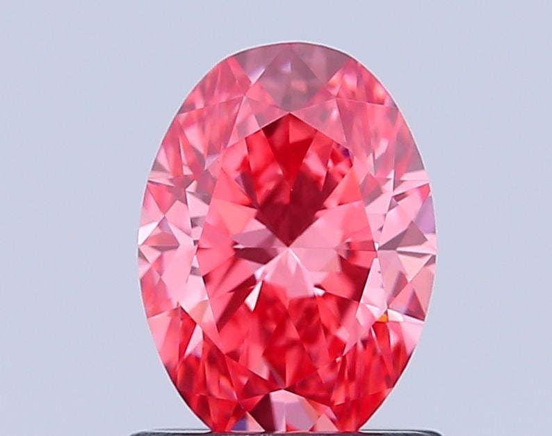 Loose Diamond - OVAL 1.0ct Fancy Vivid Pink VVS1: Loose Diamond - OVAL 1.0ct Fancy Vivid Pink VVS1 Source: This is a real non-mined Diamond that has been grown in a lab Shape: OVAL Carats: 1.0 Color: Fancy Vivid Pink Certification: IGI Video: