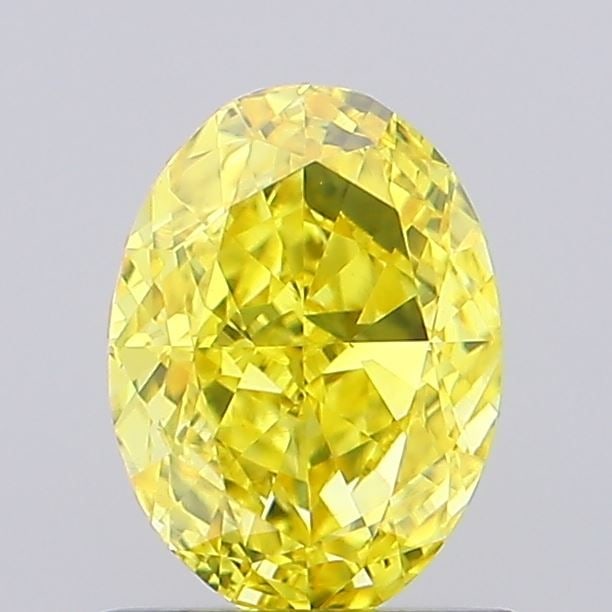 Loose Diamond - OVAL 0.93ct Fancy Vivid Yellow VS1: Loose Diamond - OVAL 0.93ct Fancy Vivid Yellow VS1 Source: This is a real non-mined Diamond that has been grown in a lab Shape: OVAL Carats: 0.93 Color: Fancy Vivid Yellow Certification: NONE The Diam