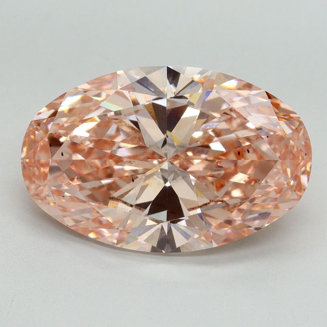Loose Diamond - OVAL 8.5ct Fancy Vivid Pink VS2: Loose Diamond - OVAL 8.5ct Fancy Vivid Pink VS2 Source: This is a real non-mined Diamond that has been grown in a lab Shape: OVAL Carats: 8.5 Color: Fancy Vivid Pink Certification: IGI Video: