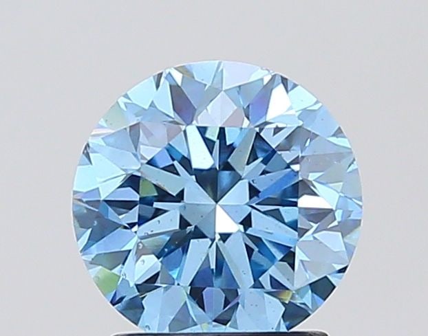 Loose Diamond - ROUND 1.99ct Fancy Vivid Blue SI1: Loose Diamond - ROUND 1.99ct Fancy Vivid Blue SI1 Source: This is a real non-mined Diamond that has been grown in a lab Shape: ROUND Carats: 1.99 Color: Fancy Vivid Blue Certification: IGI Video: