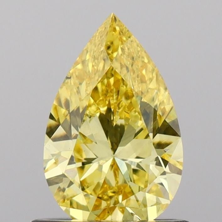Loose Diamond - PEAR 0.82ct Fancy Vivid Yellow VS2: Loose Diamond - PEAR 0.82ct Fancy Vivid Yellow VS2 Source: This is a real non-mined Diamond that has been grown in a lab Shape: PEAR Carats: 0.82 Color: Fancy Vivid Yellow Certification: IGI Video: