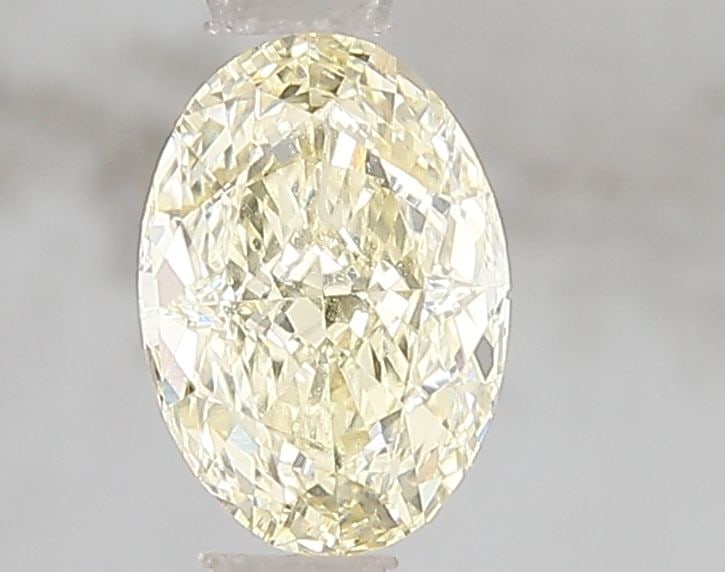 Loose Diamond - OVAL 1.05ct Fancy Yellow VS1: Loose Diamond - OVAL 1.05ct Fancy Yellow VS1 Source: This is a real non-mined Diamond that has been grown in a lab Shape: OVAL Carats: 1.05 Color: Fancy Yellow Certification: IGI Video: