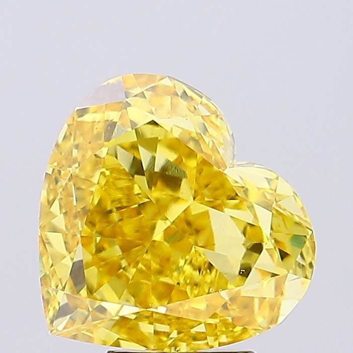 Loose Diamond - HEART 5.03ct Fancy Vivid Yellow VS2: Loose Diamond - HEART 5.03ct Fancy Vivid Yellow VS2 Source: This is a real non-mined Diamond that has been grown in a lab Shape: HEART Carats: 5.03 Color: Fancy Vivid Yellow Certification: NONE Video: