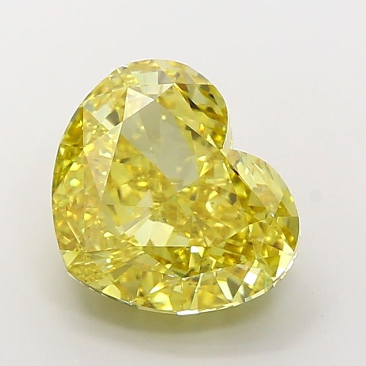 Loose Diamond - HEART 10.04ct Fancy Vivid Yellow VS1: Loose Diamond - HEART 10.04ct Fancy Vivid Yellow VS1 Source: This is a real non-mined Diamond that has been grown in a lab Shape: HEART Carats: 10.04 Color: Fancy Vivid Yellow Certification: IGI Video