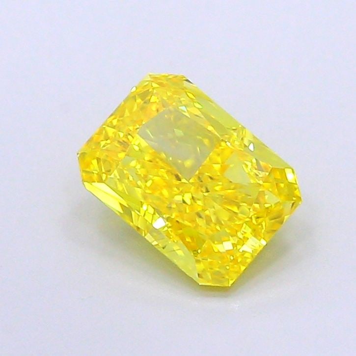 Loose Diamond - RADIANT 1.47ct Fancy Vivid Yellow VS1: Loose Diamond - RADIANT 1.47ct Fancy Vivid Yellow VS1 Source: This is a real non-mined Diamond that has been grown in a lab Shape: RADIANT Carats: 1.47 Color: Fancy Vivid Yellow Certification: IGI Vid