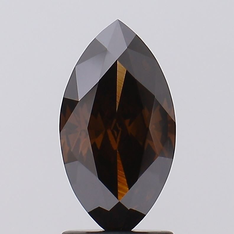 Loose Diamond - MARQUISE 1.82ct Fancy Deep Brown VS1: Loose Diamond - MARQUISE 1.82ct Fancy Deep Brown VS1 Source: This is a real non-mined Diamond that has been grown in a lab Shape: MARQUISE Carats: 1.82 Color: Fancy Deep Brown Certification: NONE Vide