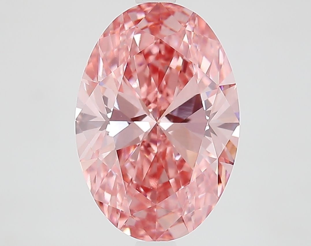 Loose Diamond - OVAL 3.38ct Fancy Vivid Pink VS1: Loose Diamond - OVAL 3.38ct Fancy Vivid Pink VS1 Source: This is a real non-mined Diamond that has been grown in a lab Shape: OVAL Carats: 3.38 Color: Fancy Vivid Pink Certification: IGI Video: