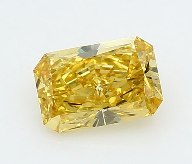 Loose Diamond - RADIANT 0.95ct Fancy Vivid Yellow VS2: Loose Diamond - RADIANT 0.95ct Fancy Vivid Yellow VS2 Source: This is a real non-mined Diamond that has been grown in a lab Shape: RADIANT Carats: 0.95 Color: Fancy Vivid Yellow Certification: IGI Vid