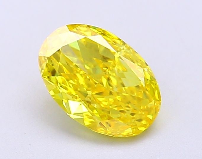 Loose Diamond - OVAL 1.02ct Fancy Vivid Yellow VS1: Loose Diamond - OVAL 1.02ct Fancy Vivid Yellow VS1 Source: This is a real non-mined Diamond that has been grown in a lab Shape: OVAL Carats: 1.02 Color: Fancy Vivid Yellow Certification: IGI Video: