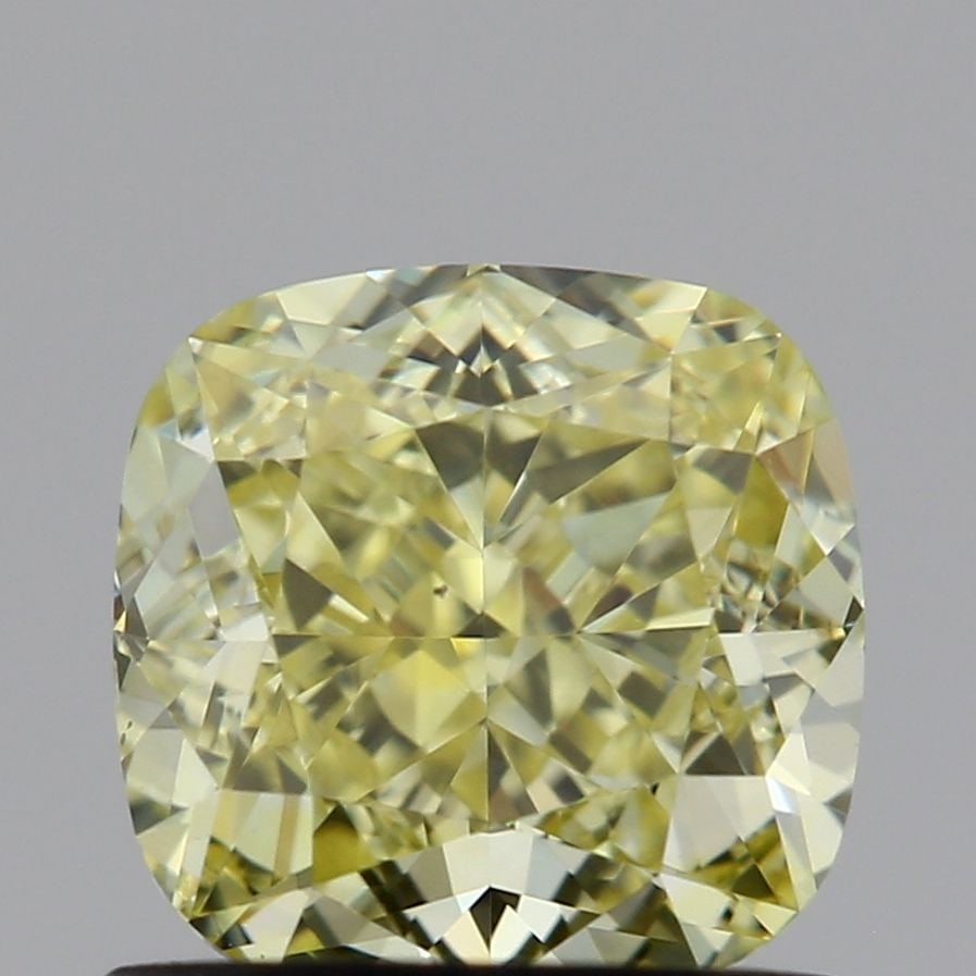 Loose Diamond - CUSHION MODIFIED 0.95ct Fancy Light Yellow VS2: Loose Diamond - CUSHION MODIFIED 0.95ct Fancy Light Yellow VS2 Source: This is a real non-mined Diamond that has been grown in a lab Shape: CUSHION MODIFIED Carats: 0.95 Color: Fancy Light Yellow Cert