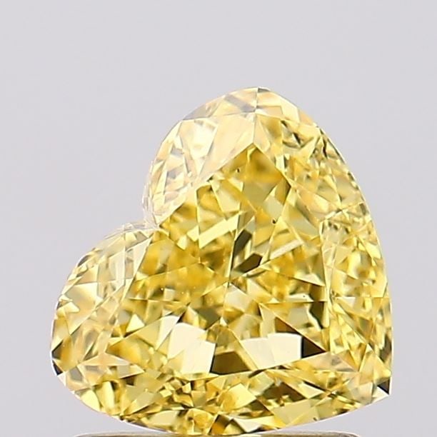 Loose Diamond - HEART 1.25ct Fancy Vivid Yellow VS2: Loose Diamond - HEART 1.25ct Fancy Vivid Yellow VS2 Source: This is a real non-mined Diamond that has been grown in a lab Shape: HEART Carats: 1.25 Color: Fancy Vivid Yellow Certification: IGI Video: