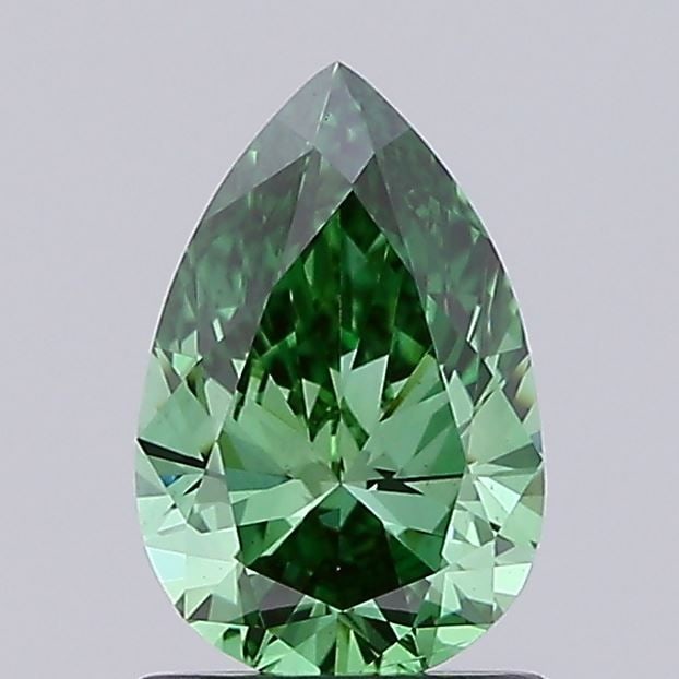 Loose Diamond - PEAR 1.01ct Fancy Vivid Green VS2: Loose Diamond - PEAR 1.01ct Fancy Vivid Green VS2 Source: This is a real non-mined Diamond that has been grown in a lab Shape: PEAR Carats: 1.01 Color: Fancy Vivid Green Certification: IGI Video: