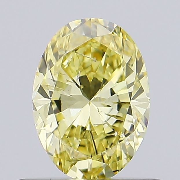 Loose Diamond - OVAL 0.52ct Fancy Vivid Yellow SI2: Loose Diamond - OVAL 0.52ct Fancy Vivid Yellow SI2 Source: This is a real non-mined Diamond that has been grown in a lab Shape: OVAL Carats: 0.52 Color: Fancy Vivid Yellow Certification: NONE Video: