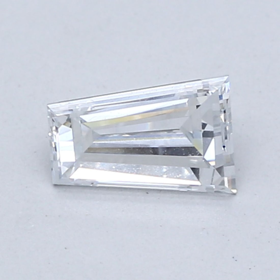 Loose Diamond - TAPERED BAGUETTE 0.77ct Fancy Light Blue VS1: Loose Diamond - TAPERED BAGUETTE 0.77ct Fancy Light Blue VS1 Source: This is a real non-mined Diamond that has been grown in a lab Shape: TAPERED BAGUETTE Carats: 0.77 Color: Fancy Light Blue Certific