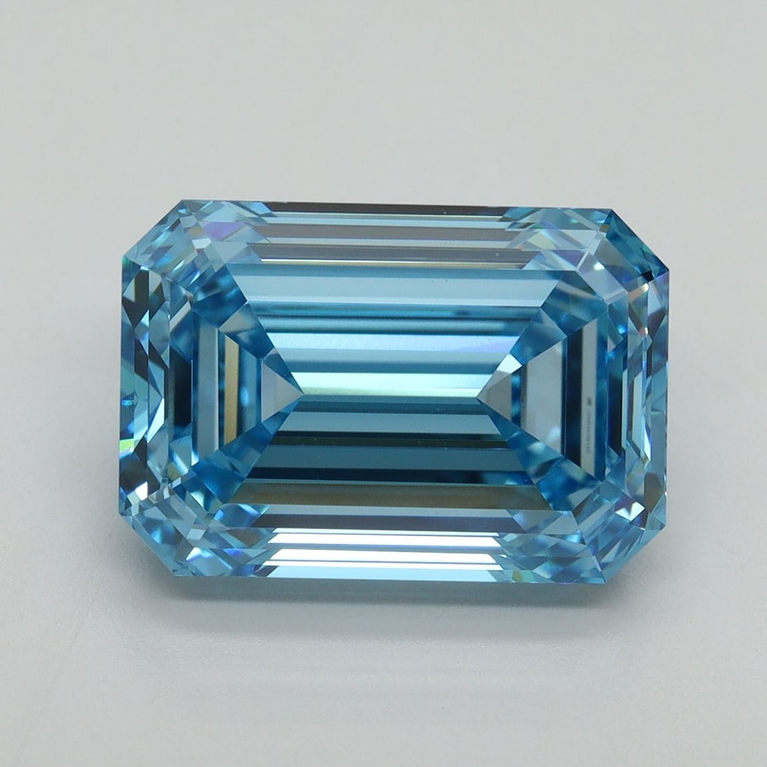 Loose Diamond - EMERALD 7.09ct Fancy Vivid Blue VVS2: Loose Diamond - EMERALD 7.09ct Fancy Vivid Blue VVS2 Source: This is a real non-mined Diamond that has been grown in a lab Shape: EMERALD Carats: 7.09 Color: Fancy Vivid Blue Certification: IGI Video: